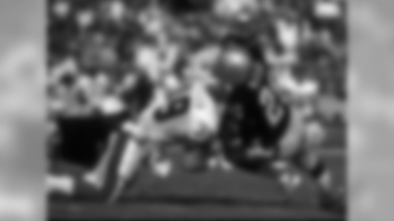 Vann McElroy lays a big hit in a 1987 game against the Bills.