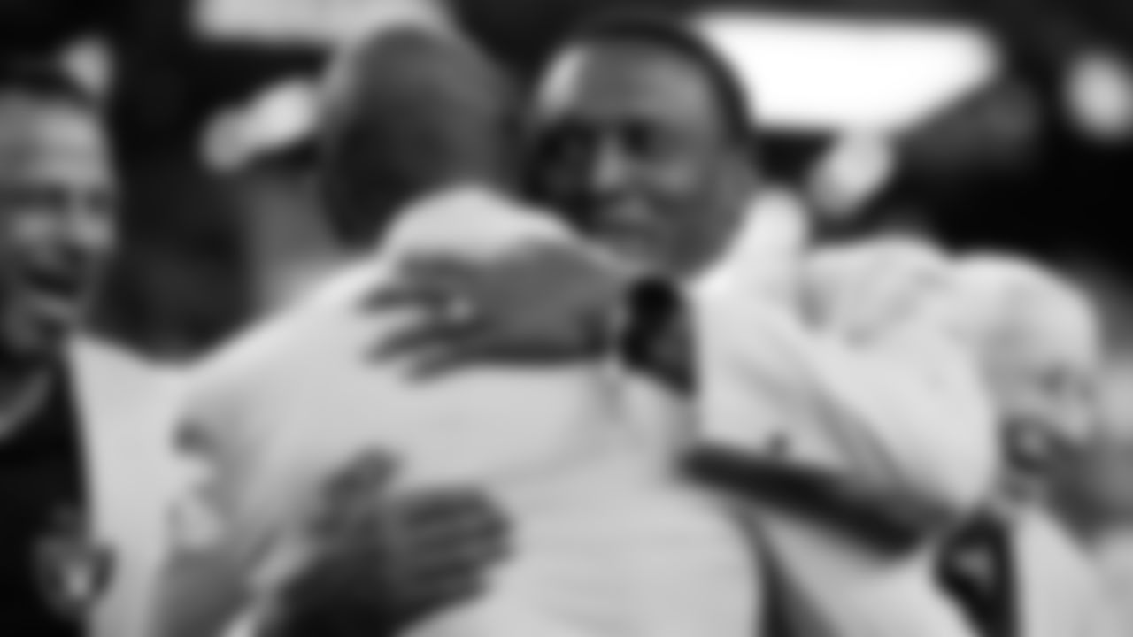 Las Vegas Raiders Hall of Famers, Charles Woodson and Tim Brown, hug after Woodson was presented with the Ring of Excellence before the Las Vegas Raiders regular season home game against the Kansas City Chiefs.