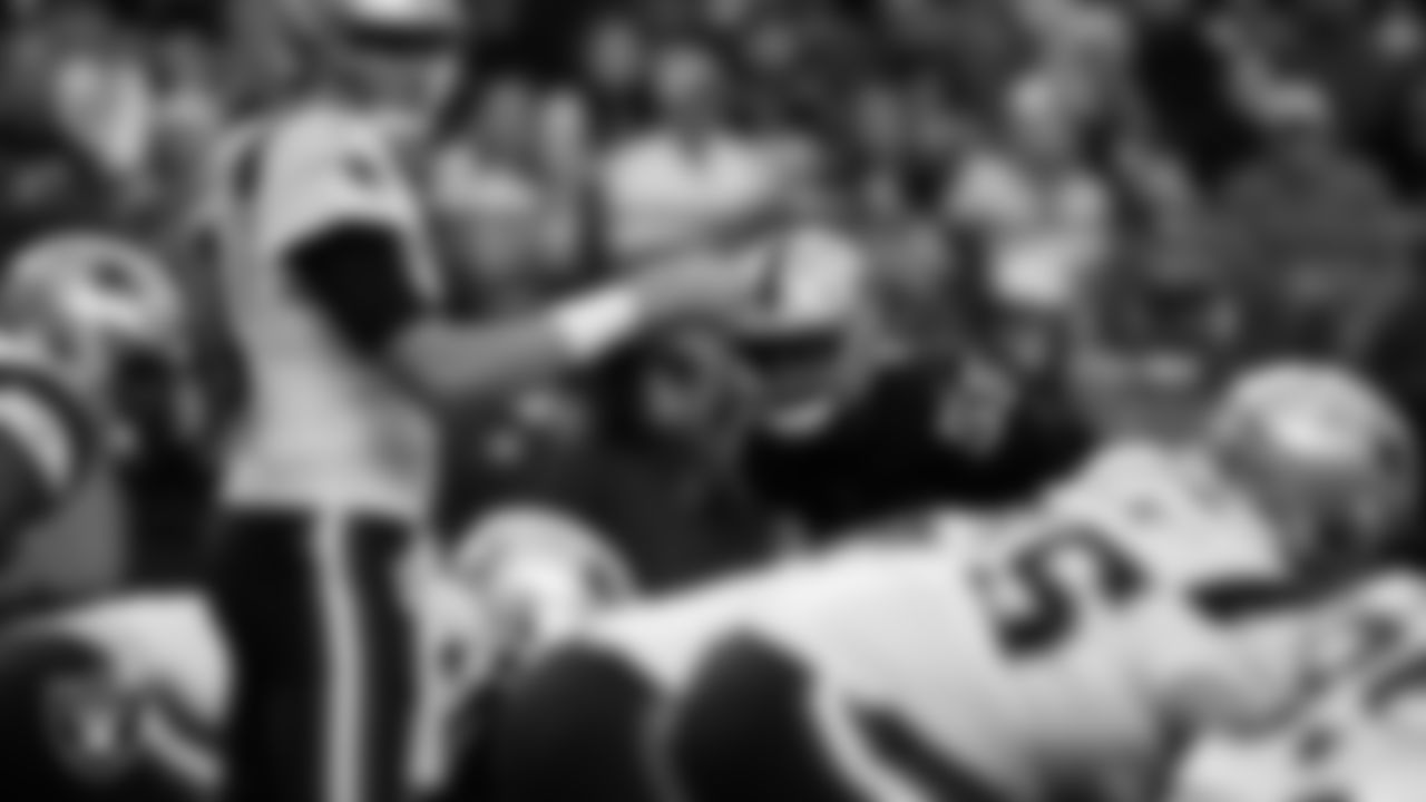 Las Vegas Raiders defensive end Chandler Jones (55) eyes the quarterback during the regular season home game against the New England Patriots at Allegiant Stadium.