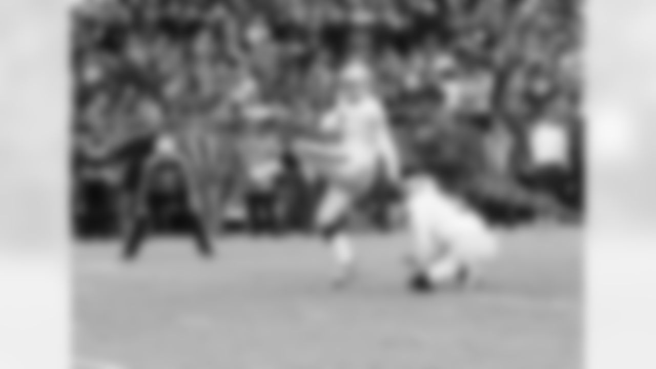 K Sebastian Janikowski kicks the extra point.