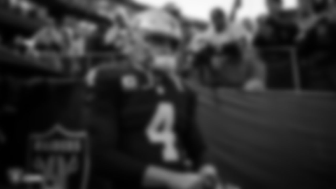 Oakland Raiders quarterback Derek Carr (4) before the Oakland Raiders regular season game against the Denver Broncos at Oakland Alameda-County Coliseum on Monday, December 24th, 2018, in Oakland, California. The Oakland Raiders won 27-14.