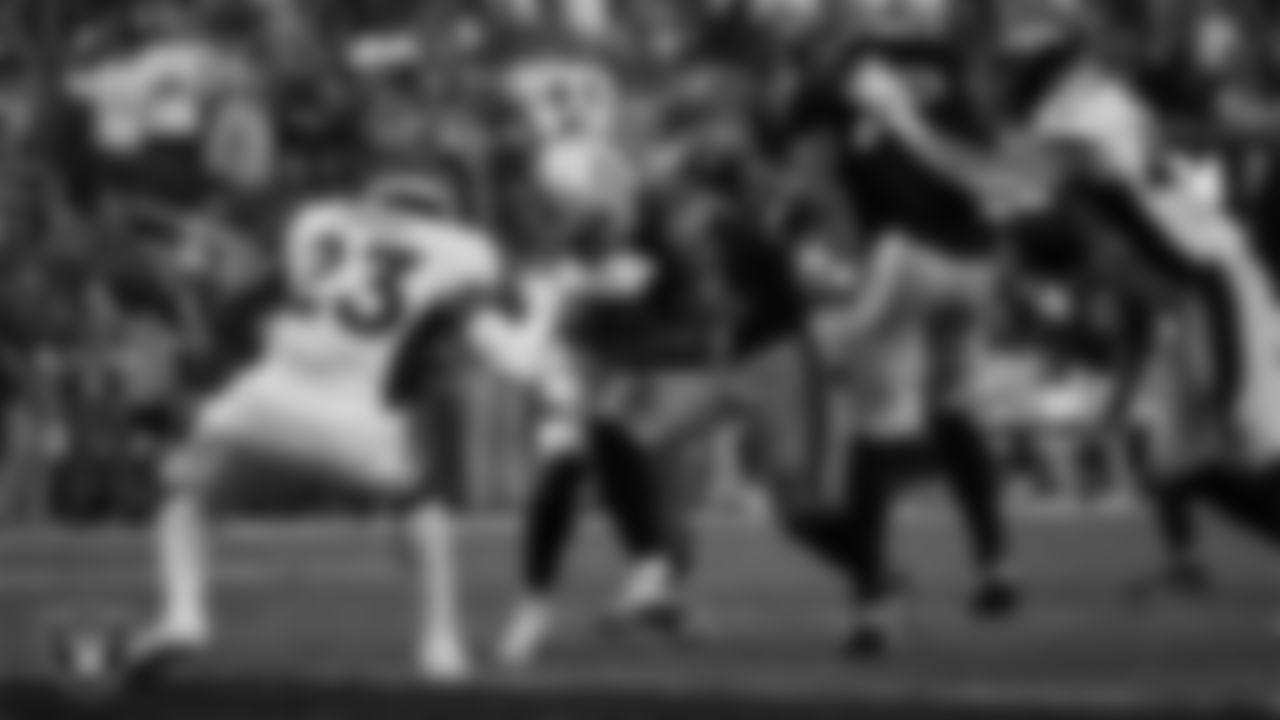 Las Vegas Raiders running back Josh Jacobs (28) rushes for a 7-yard touchdown during the regular season home game against the Denver Broncos at Allegiant Stadium.