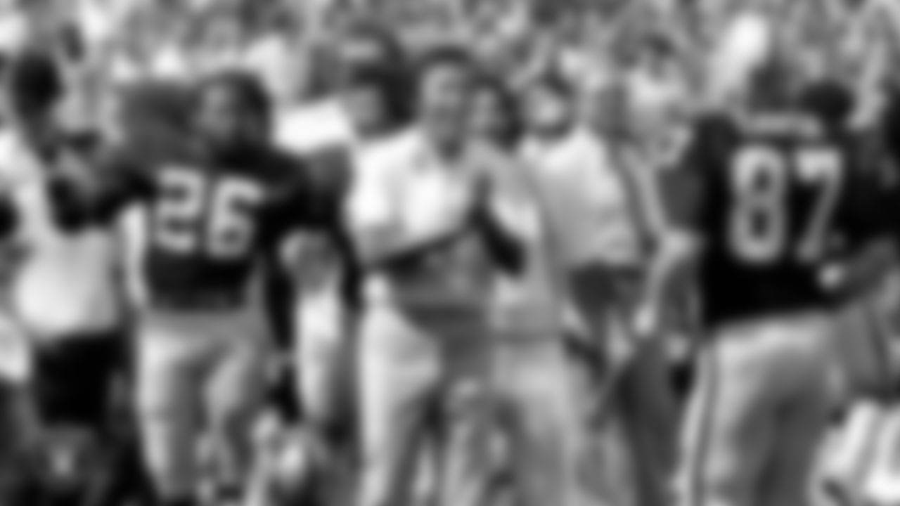 Tom Flores joined the Raiders coaching staff in 1972 as a wide receivers coach under John Madden. After Madden retired, Flores took over as Head Coach from 1979-87, winning 83 games and leading the Raiders to victories in Super Bowl XV and XVIII.