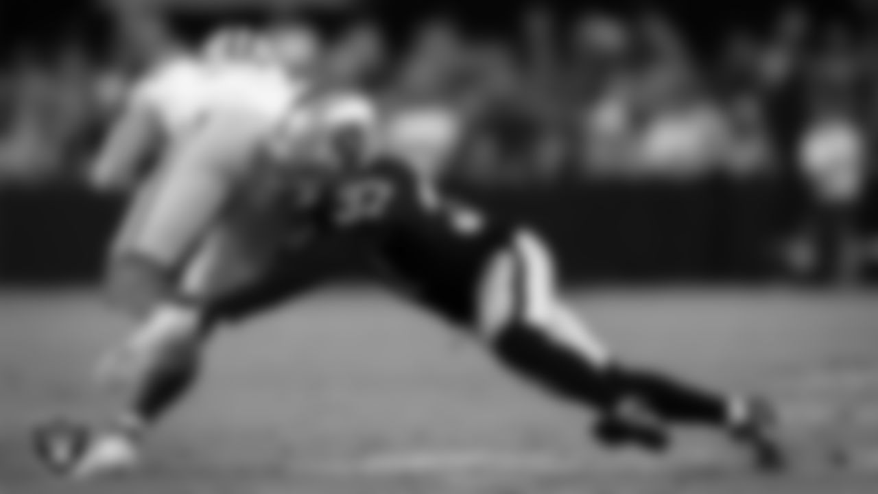 Las Vegas Raiders cornerback Tyler Hall (37) makes a tackle during the regular season home game against the Green Bay Packers at Allegiant Stadium.