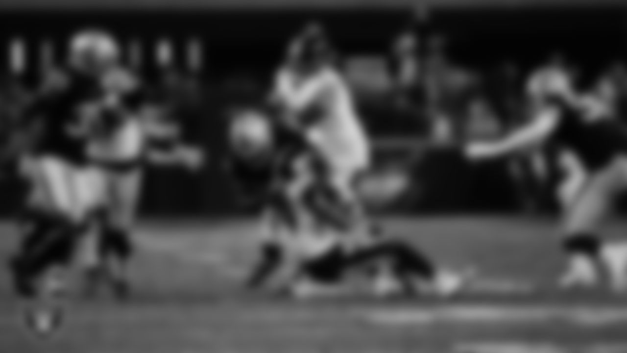 Las Vegas Raiders linebacker Divine Deablo (5) makes a tackle during the regular season home game against the Pittsburgh Steelers at Allegiant Stadium.
