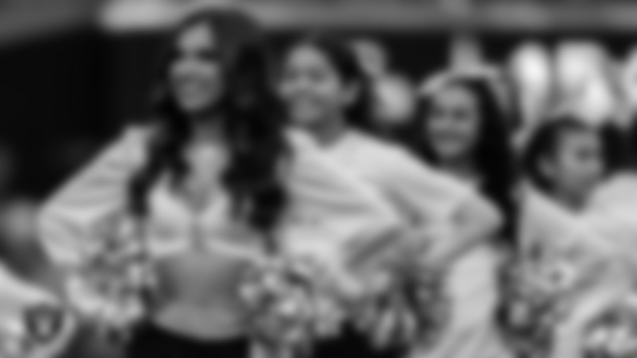The Raiderettes and Junior Raiderettes perform on the field before the regular season home game against the Los Angeles Chargers at Allegiant Stadium.