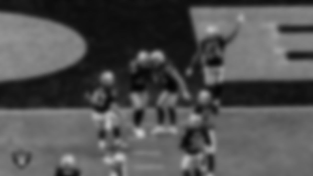 Las Vegas Raiders safety Dallin Leavitt (32) celebrates with teammates after downing a punt at the two yard line during the regular season home game against the Denver Broncos.