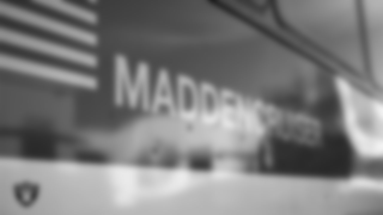 John Madden's "Madden Cruiser I" is unloaded outside of Intermountain Healthcare Performance Center.