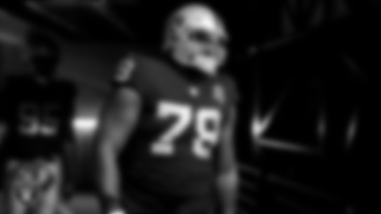 The Raiders walk down the tunnel before the regular season game against the Denver Broncos at Allegiant Stadium.