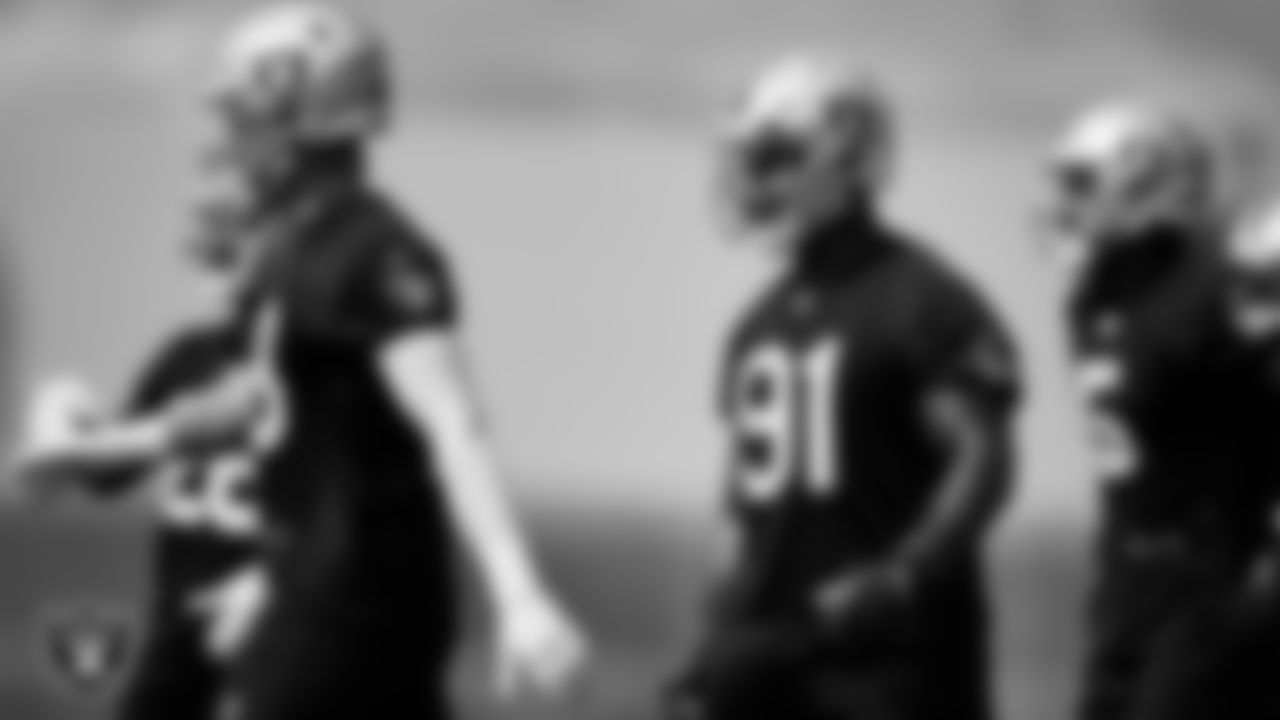 Las Vegas Raiders defensive end Maxx Crosby (98) and defensive tackle Bilal Nichols (91) during practice at Intermountain Healthcare Performance Center.
