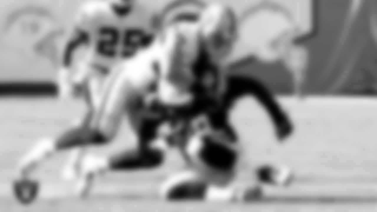 Raiders linebacker Miles Burris (55) makes a tackle during the regular season away game against the San Diego Chargers at Qualcomm Stadium, Sunday, November 16, 2014.