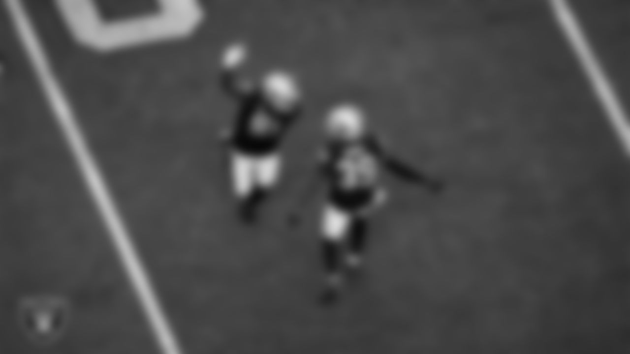 Las Vegas Raiders defensive end Yannick Ngakoue (91) celebrates with cornerback Nate Hobbs (39) during the regular season home game against the Philadelphia Eagles.