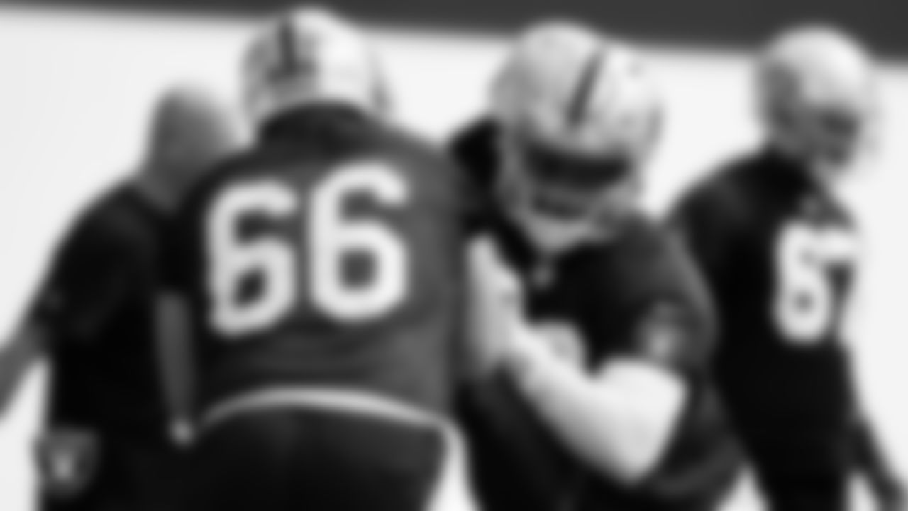 Las Vegas Raiders center Nick Martin (66) and tackle Alex Leatherwood (70) during practice at Intermountain Healthcare Performance Center.