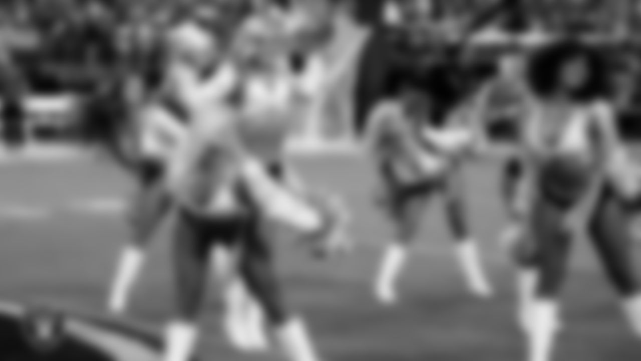Raiderette Kennedy performs on the field before the regular season home game against the Green Bay Packers at Allegiant Stadium.