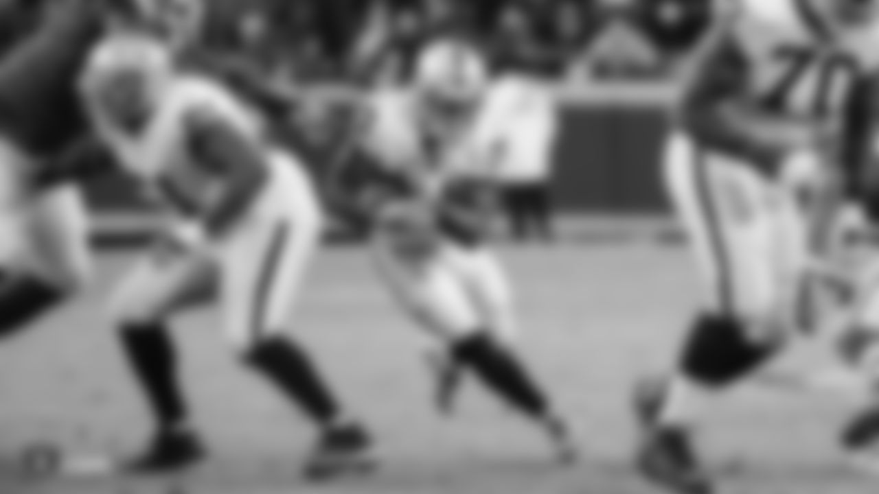 Oakland Raiders center Rodney Hudson (61), running back Jalen Richard (30), and guard/tackle Kelechi Osemele (70) during the Oakland Raiders regular season game against the Kansas City Chiefs at Arrowhead Stadium, Sunday, December 30, 2018, in Kansas City, Missouri. The Oakland Raiders lost 35-3.