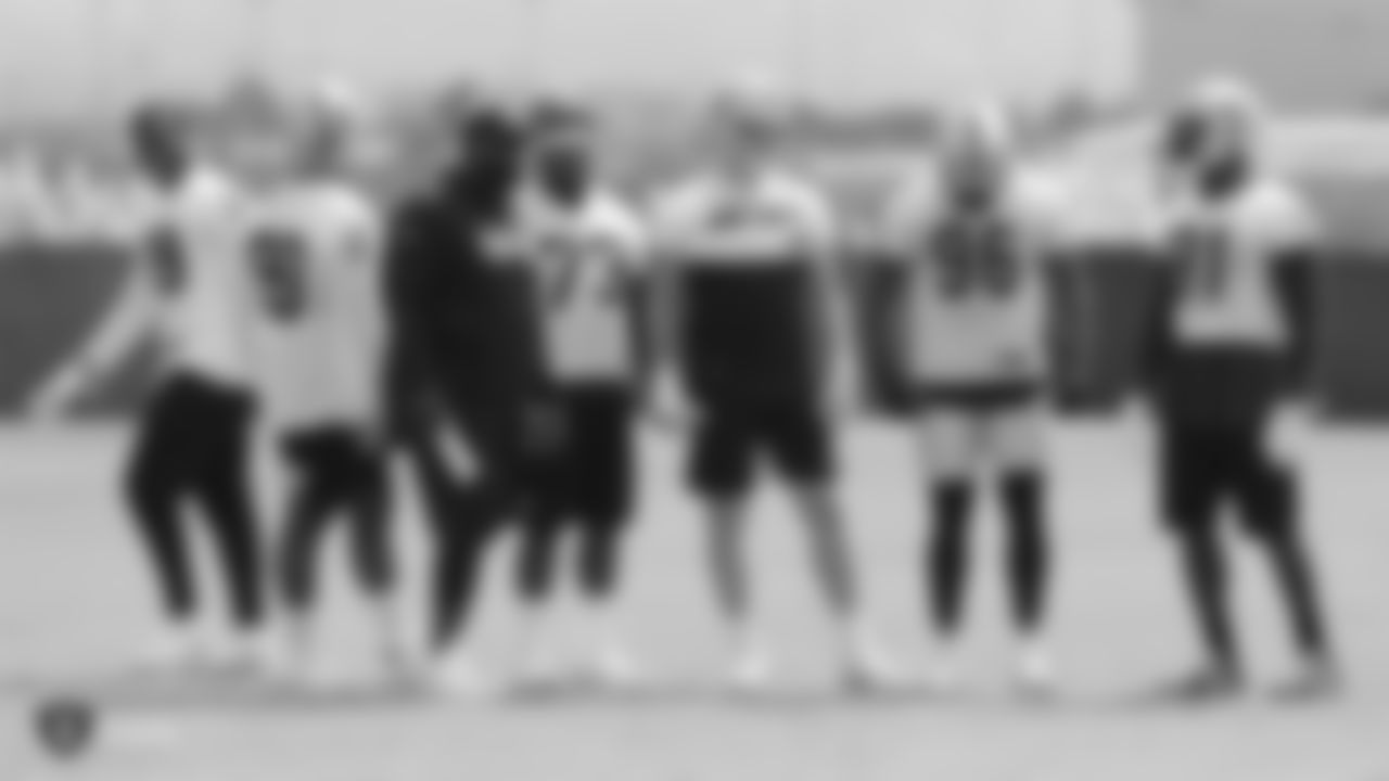 Raiders defensive end Arden Key (99), defensive tackle Johnathan Hankins (90), defensive line coach Brentson Buckner, defensive tackle Maurice Hurst (73), defensive end Maxx Crosby (98), defensive end Clelin Ferrell (96), and defensive end Benson Mayowa (91) on the field for practice.