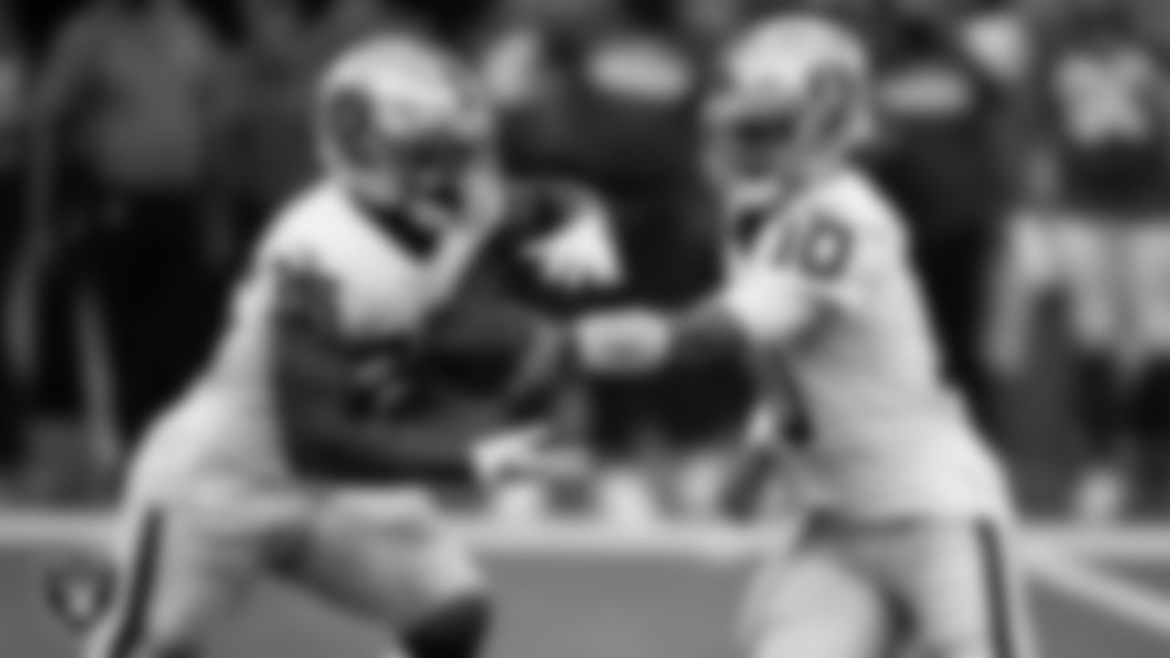 Las Vegas Raiders running back Zamir White (35) and quarterback Jimmy Garoppolo(10) during the preseason away game against the Los Angeles Rams at Sofi Stadium.