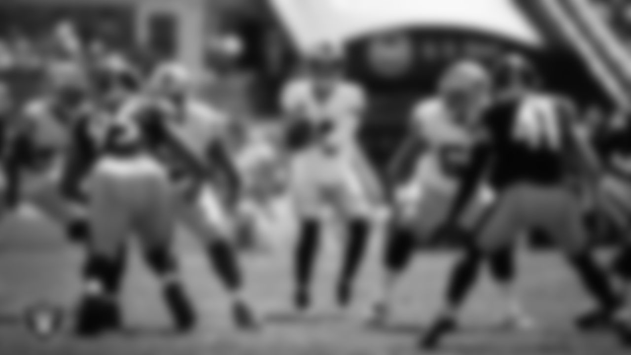 Las Vegas Raiders quarterback Derek Carr (4) receives the snap during the regular season away game against the Pittsburgh Steelers.