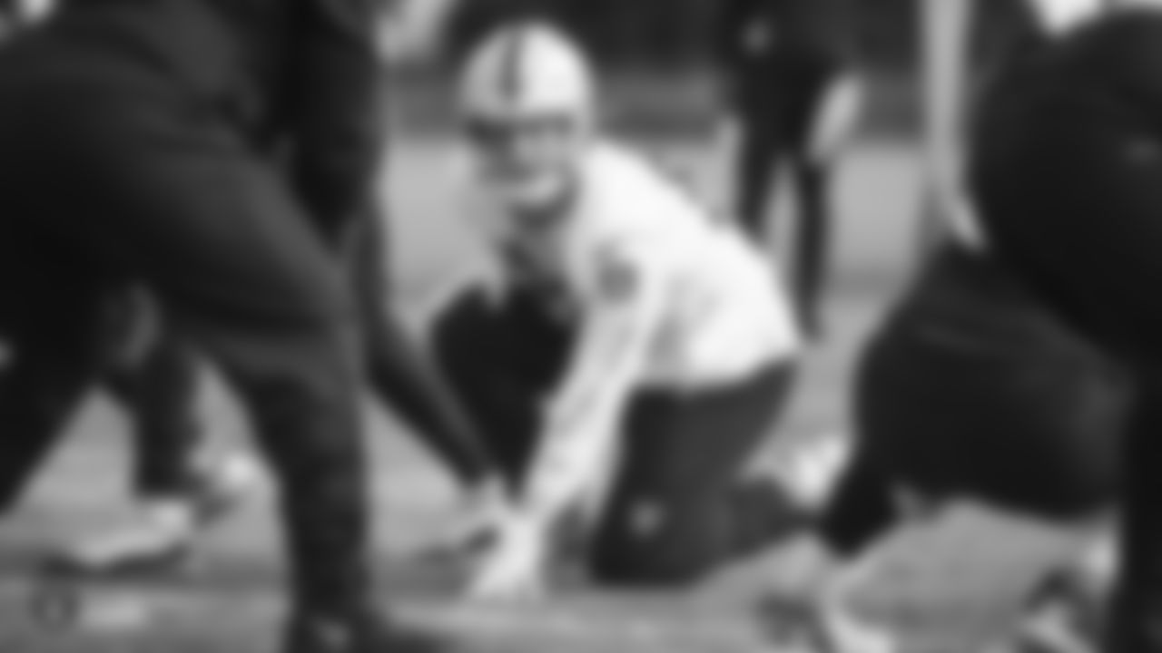 Raiders defensive end Maxx Crosby (98) lines up before the snap during practice.