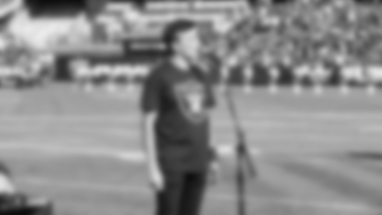 Grandson of Raiders alumnus Tom Flores, Brian Flores, performs the national anthem before the Raiders preseason game against the Los Angeles Rams.