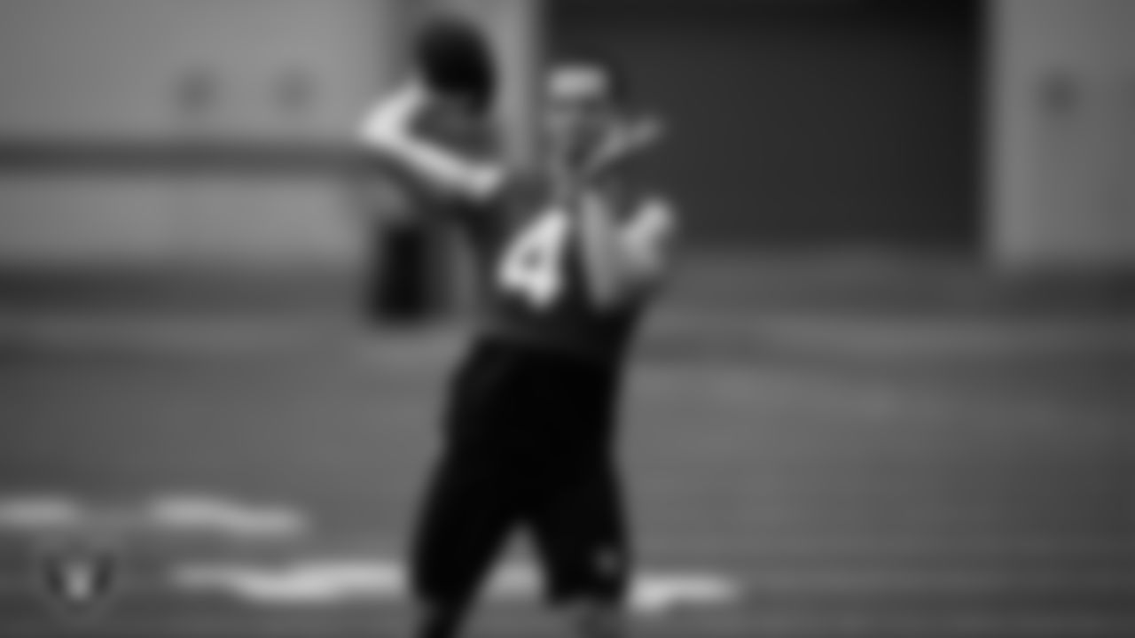 Las Vegas Raiders quarterback Derek Carr (4) on the field for a walkthrough.