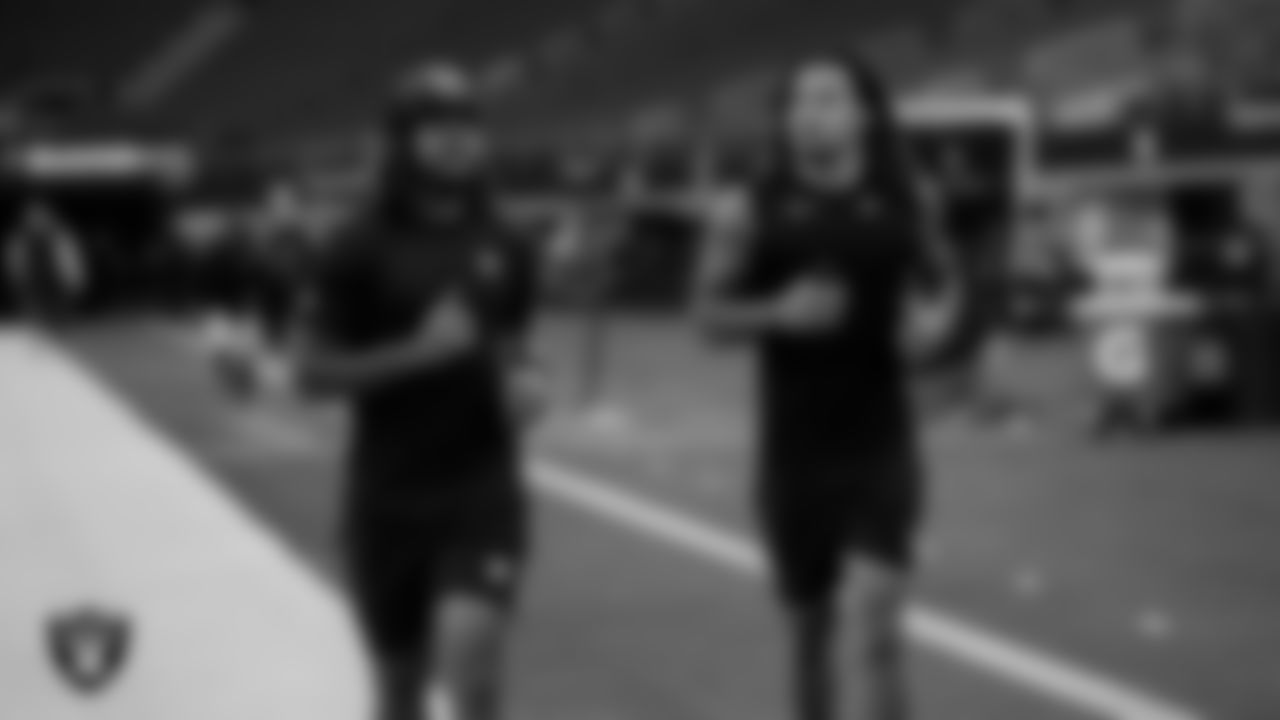 Las Vegas Raiders safety Roderic Teamer (33) and safety Tre'von Moehrig (25) warming up before the preseason away game against the Dallas Cowboys at AT&T Stadium.