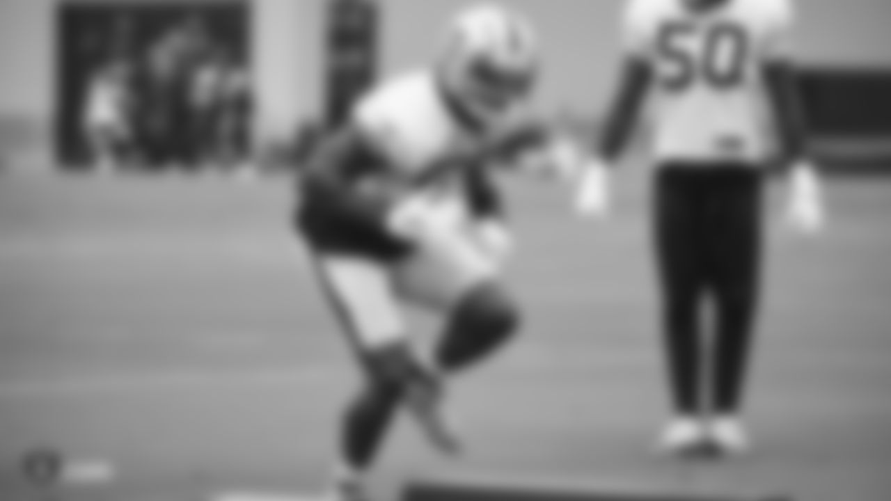 Raiders linebacker Tahir Whitehead (59) goes through defensive drills.