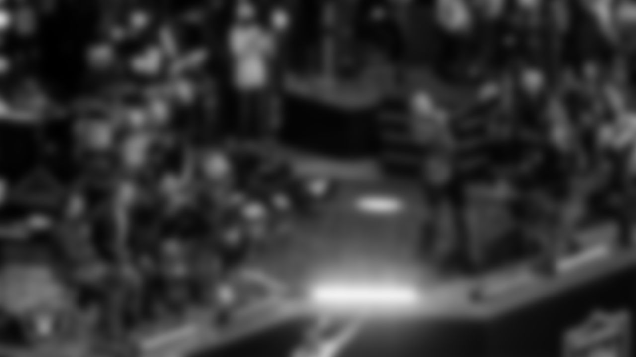 UFC octagon announcer Bruce Buffer pumps up the crowd before the Las Vegas Raiders' regular season home game against the Denver Broncos at Allegiant Stadium.