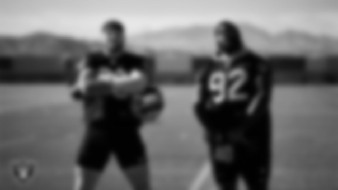 Las Vegas Raiders defensive end Maxx Crosby (98) and defensive lineman Neil Farrell Jr. (92) during practice at Intermountain Healthcare Performance Center.
