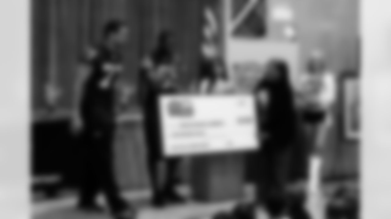 WR Darrius Heyward-Bey and DE Matt Shaughnessy visited Thurgood Marshall Elementary School in Oakland to speak to the students as part of the Play 60 campaign as well as present a check to the school. Photo by Tony Gonzales.
