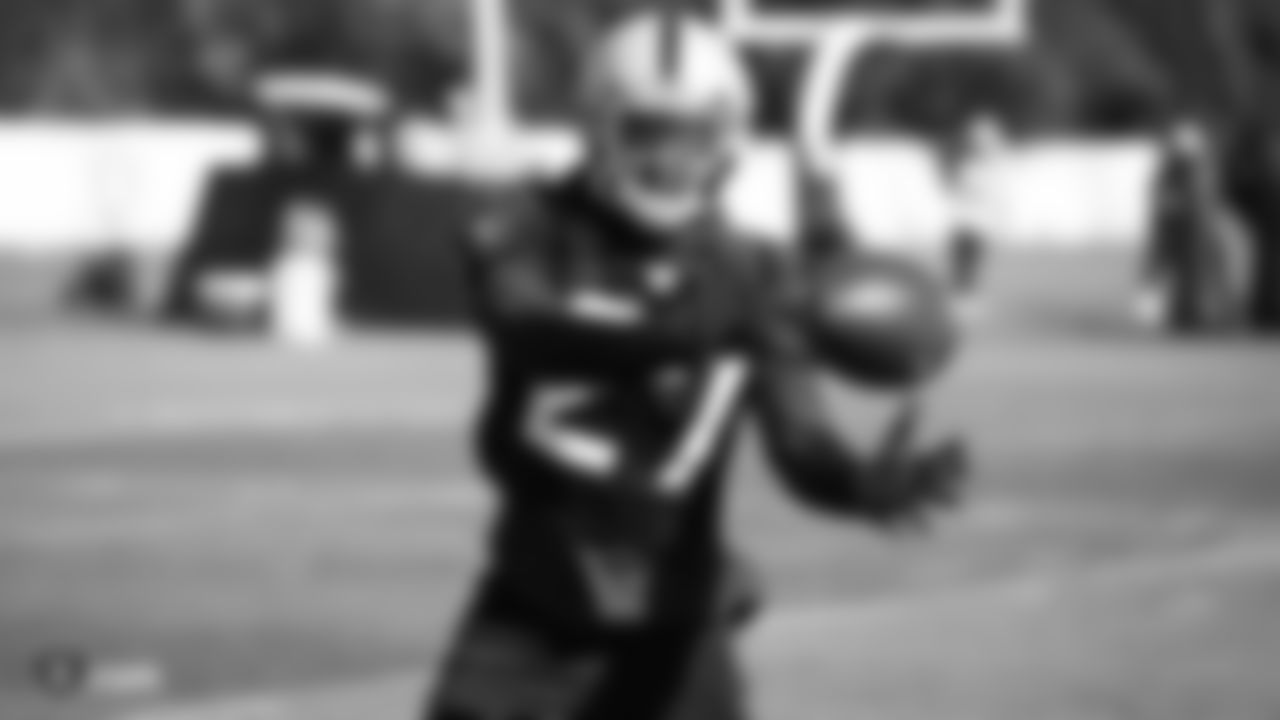 Raiders cornerback Trayvon Mullen (27) goes for a catch during practice.