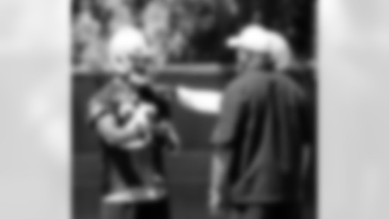 DBs coach Johnnie Lynn works with DB Brandon Underwood