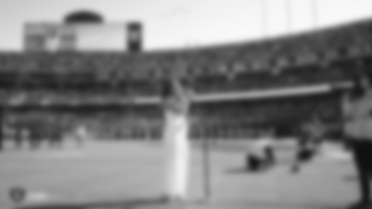 Singer Dinah Jane performs the national anthem as the Marine Corps Air Staton Miramar performs a flyover before the Raiders regular season game against the Detroit Lions.