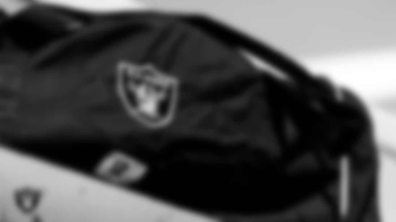 Las Vegas Raiders wide receiver Zay Jones' (12) duffel bag is loaded on the plane before the team departs for the regular season away game against the New England Patriots.