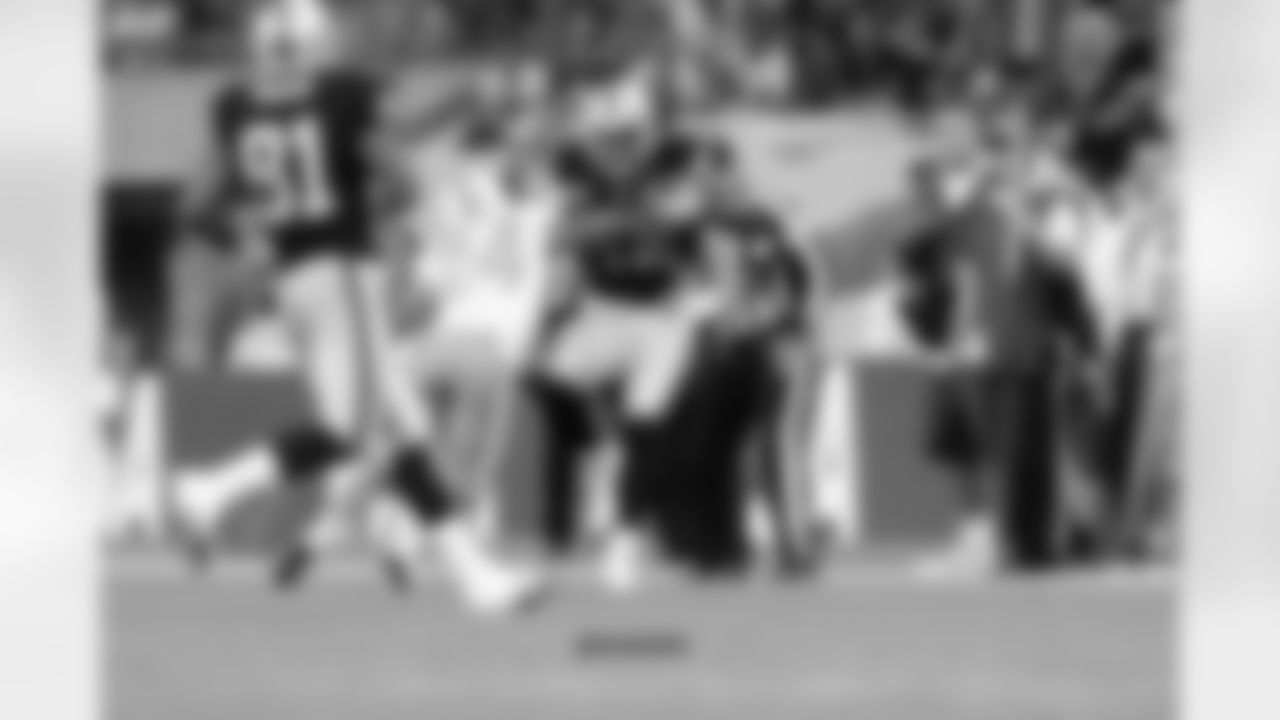 FB Marcel Reece gets stopped after the catch.
