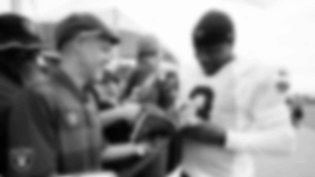 Las Vegas Raiders wide receiver DeAndre Carter (3) signs autographs for fans after practice at 2023 Training Camp at Intermountain Health Performance Center.