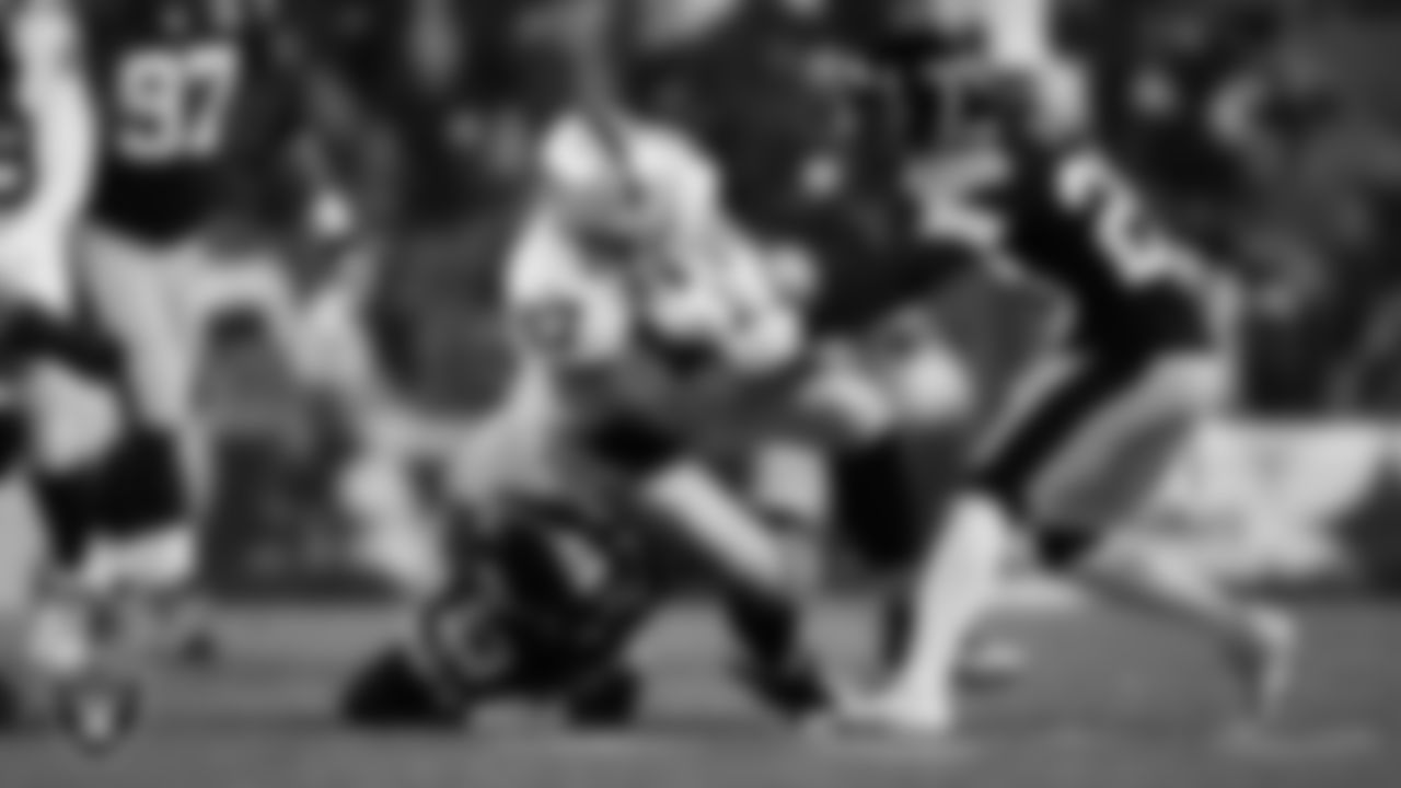 Las Vegas Raiders tight end Foster Moreau (87) runs after making a catch during the regular season away game against the Pittsburgh Steelers at Acrisure Stadium.