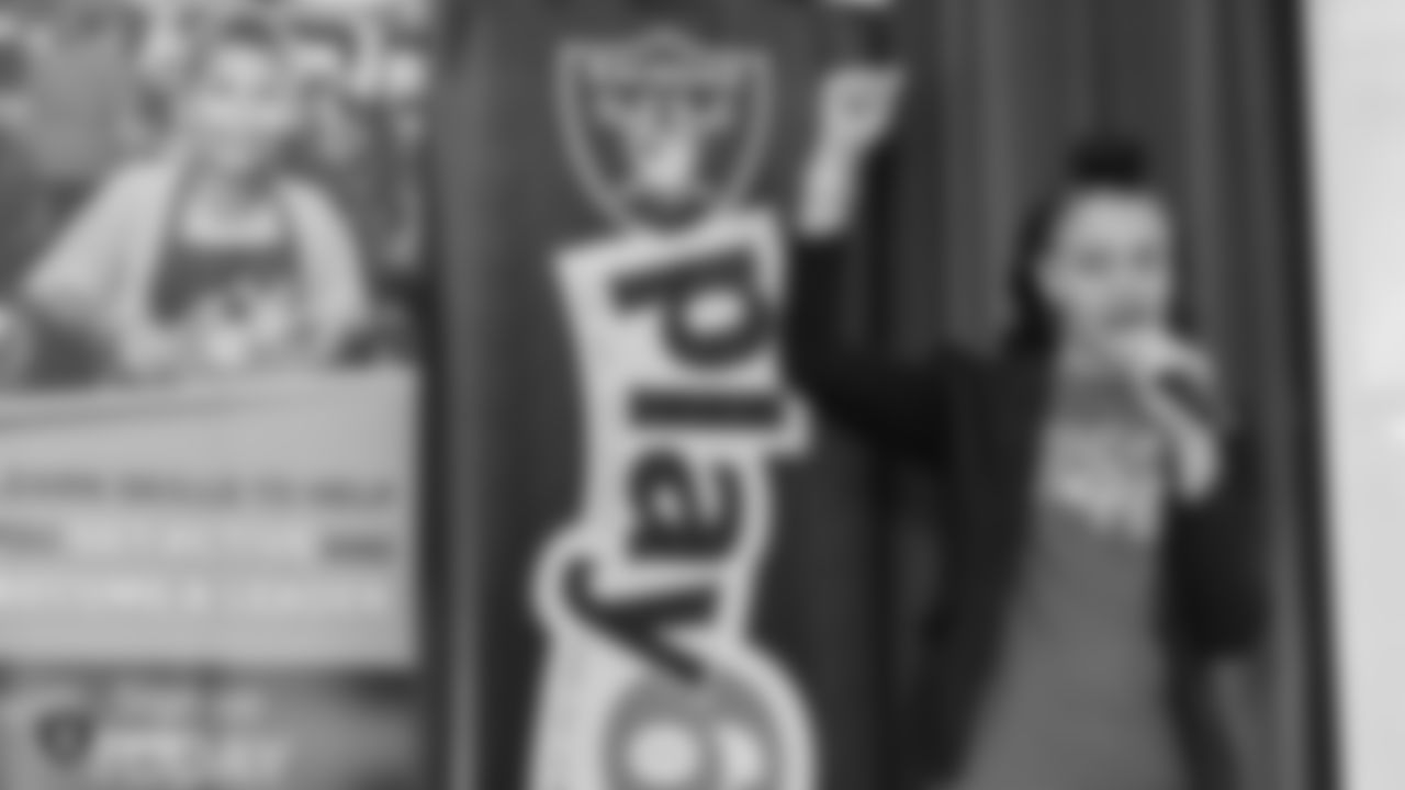 Local teacher Ada Feliciano of Forbuss Elementary School wins two tickets to Super Bowl LIII for her excellent work with the Fuel Up to Play 60 program, on Thursday, January 31, 2019, in Las Vegas, Nev. The Raiders showed their support by gifting Feliciano with new luggage to accompany her on her trip.