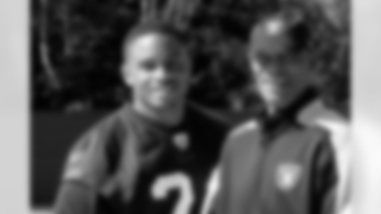 Pro Bowl CB Nnamdi Asomugha poses for a photo with Hall of Fame CB Willie Brown.
