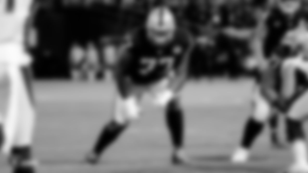 Raiders tackle Trent Brown (77) lines up before the snap during the Raiders regular season game against the Denver Broncos.
