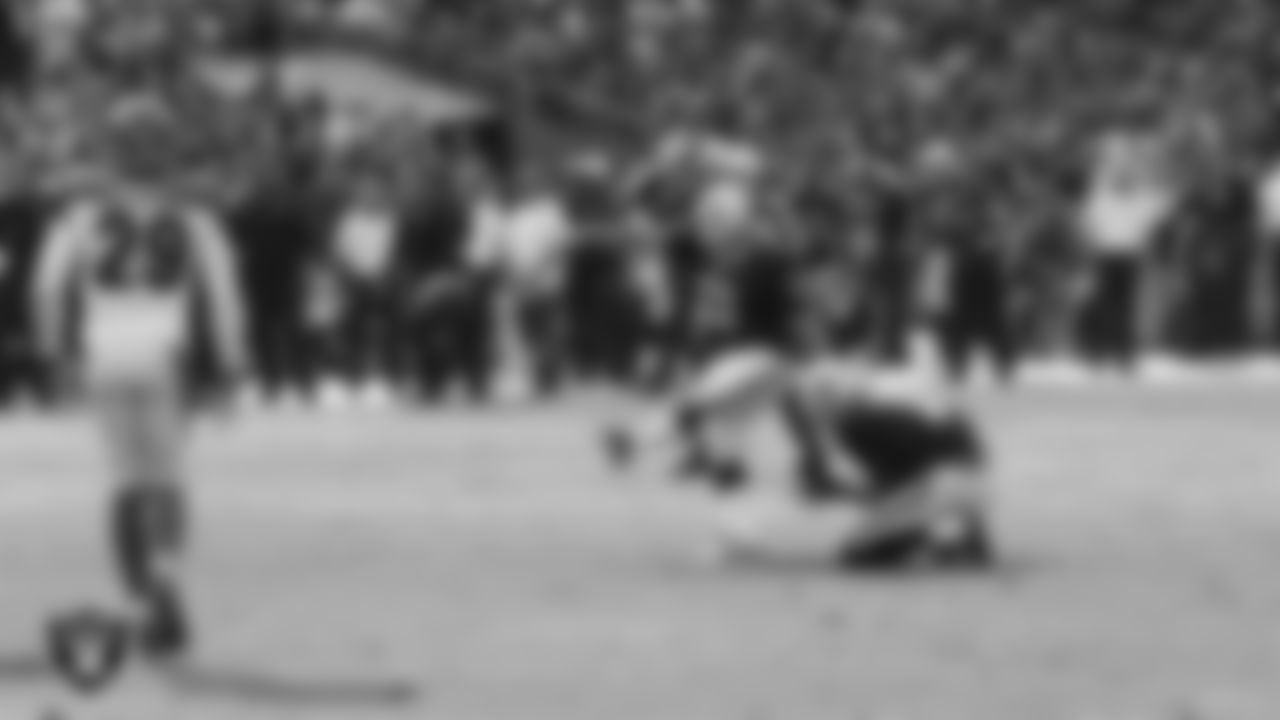 Oakland Raiders kicker Sebastian Janikowski (11) kicks a PAT during the regular season home game against the Cincinnati Bengals at O.Co Coliseum, Sunday, September 13, 2015, in Oakland, Cailf.