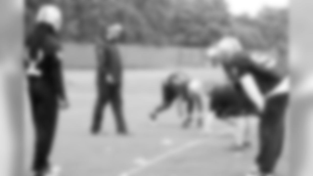 Head Coach Dennis Allen works with the defense.