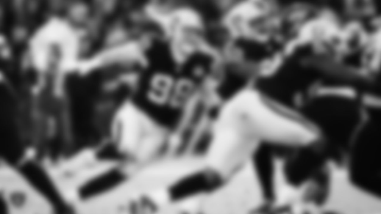 Oakland Raiders defensive end Maxx Crosby (98) rushes the quarterback during the regular season game against the Jacksonville Jaguars.