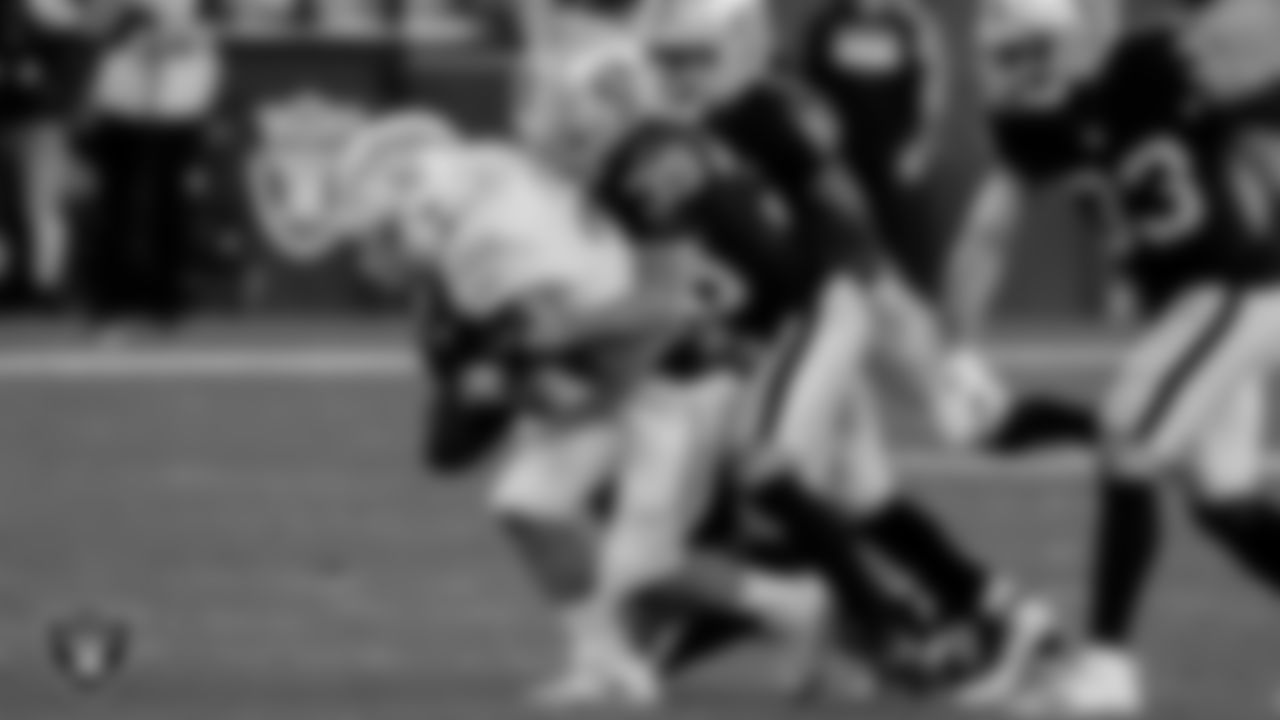 Las Vegas Raiders cornerback Nate Hobbs (39) makes a tackle during the regular season home game against the Los Angeles Chargers.
