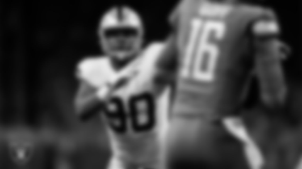 Las Vegas Raiders defensive lineman Jerry Tillery (90) pressures the quarterback during the regular season away game against the Detroit Lions at Ford Field.