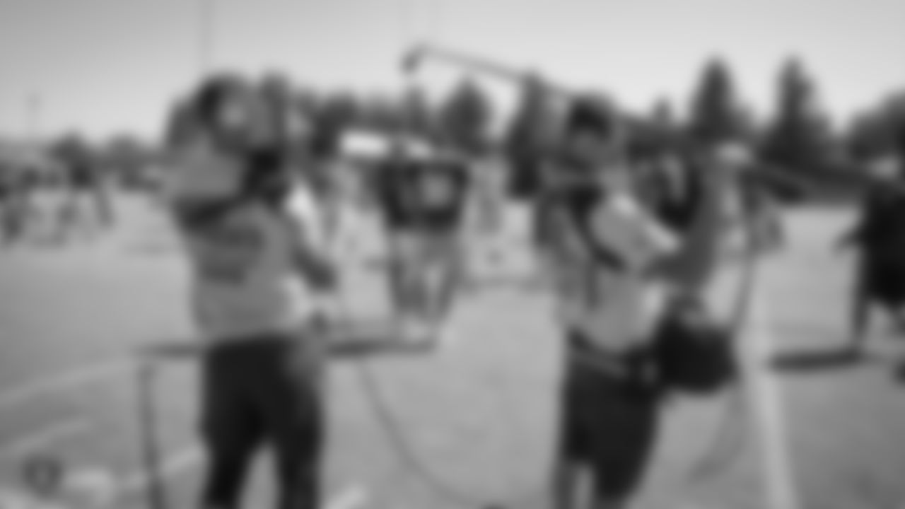 The Hard Knocks film crew on the field for practice at 2019 Training Camp.