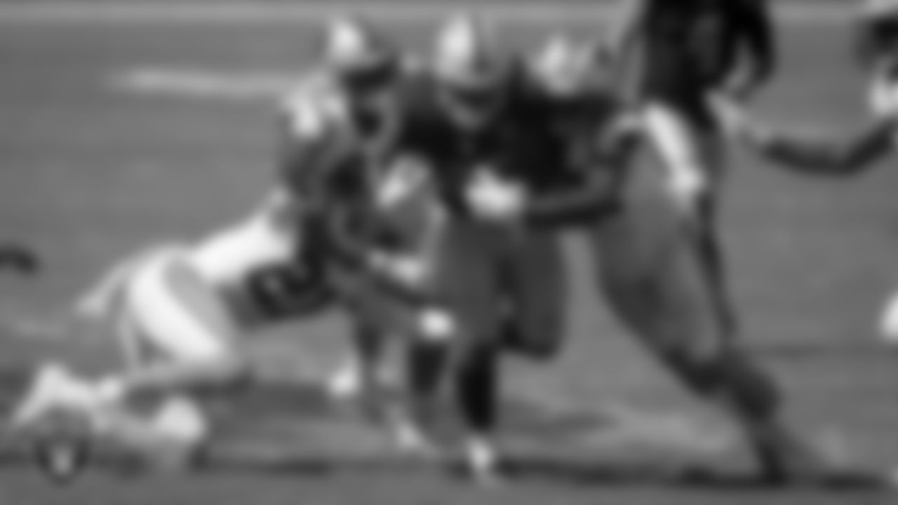 Las Vegas Raiders running back Josh Jacobs (28) rushes during the regular season away game against the Carolina Panthers.