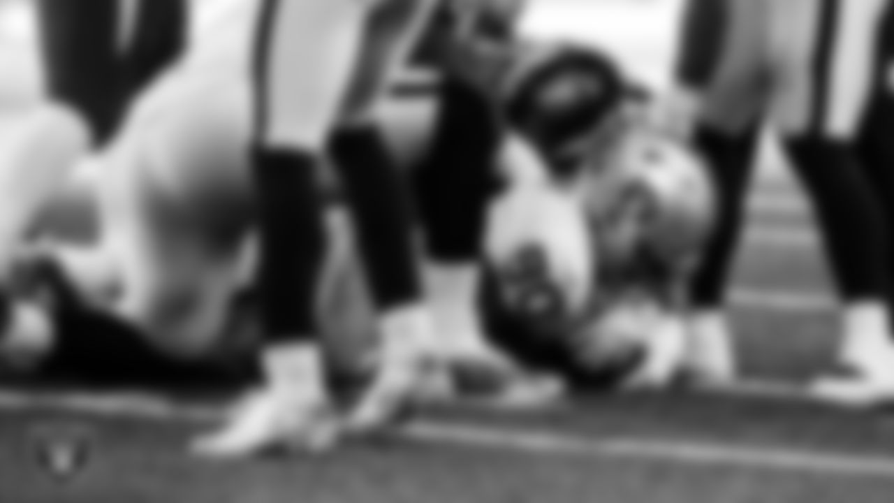 Las Vegas Raiders defensive tackle Johnathan Hankins (90) recovers a fumble during the regular season away game against the New York Jets.