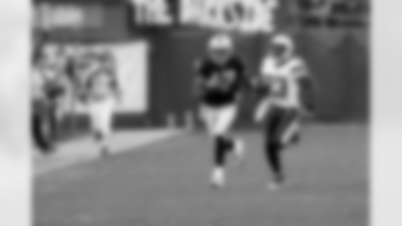 WR Denarius Moore uses his speed to get to the San Diego 11-yard line.
