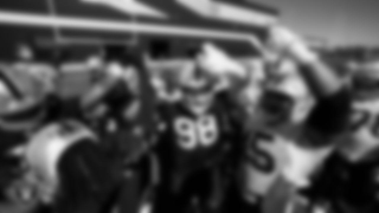 The Las Vegas Raiders huddle during practice at Intermountain Health Performance Center.